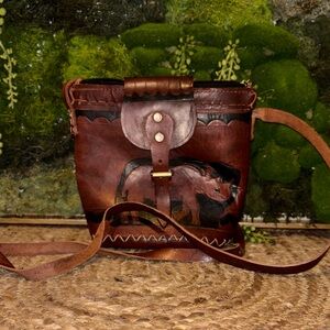 Artisan Leather Crossbody Bag with Rhino Design
